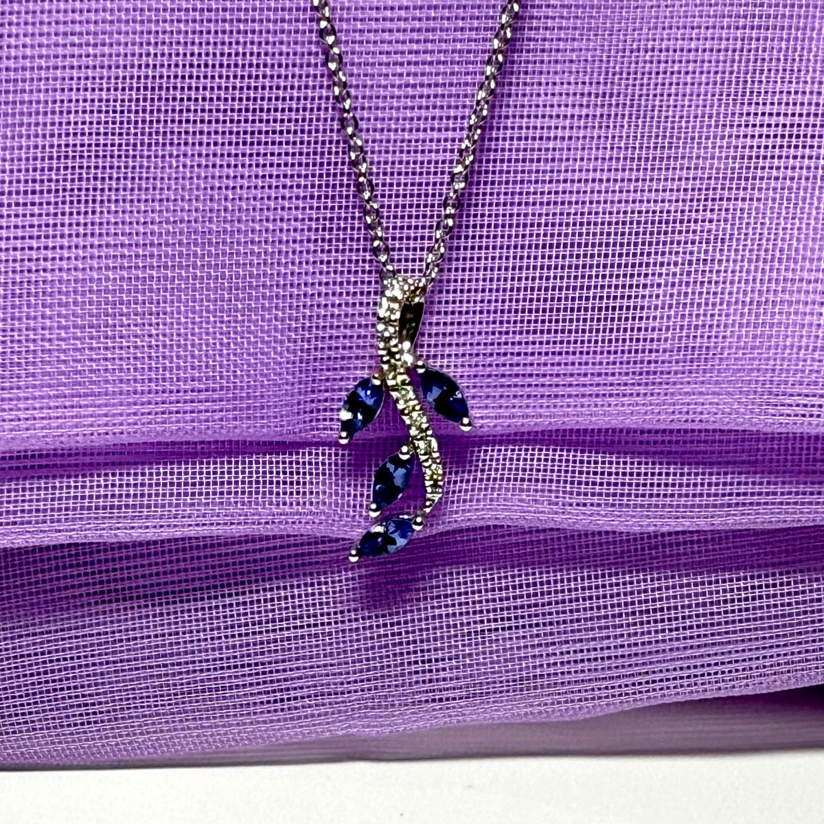 Tanzanite and diamond white Gold fancy spray necklace