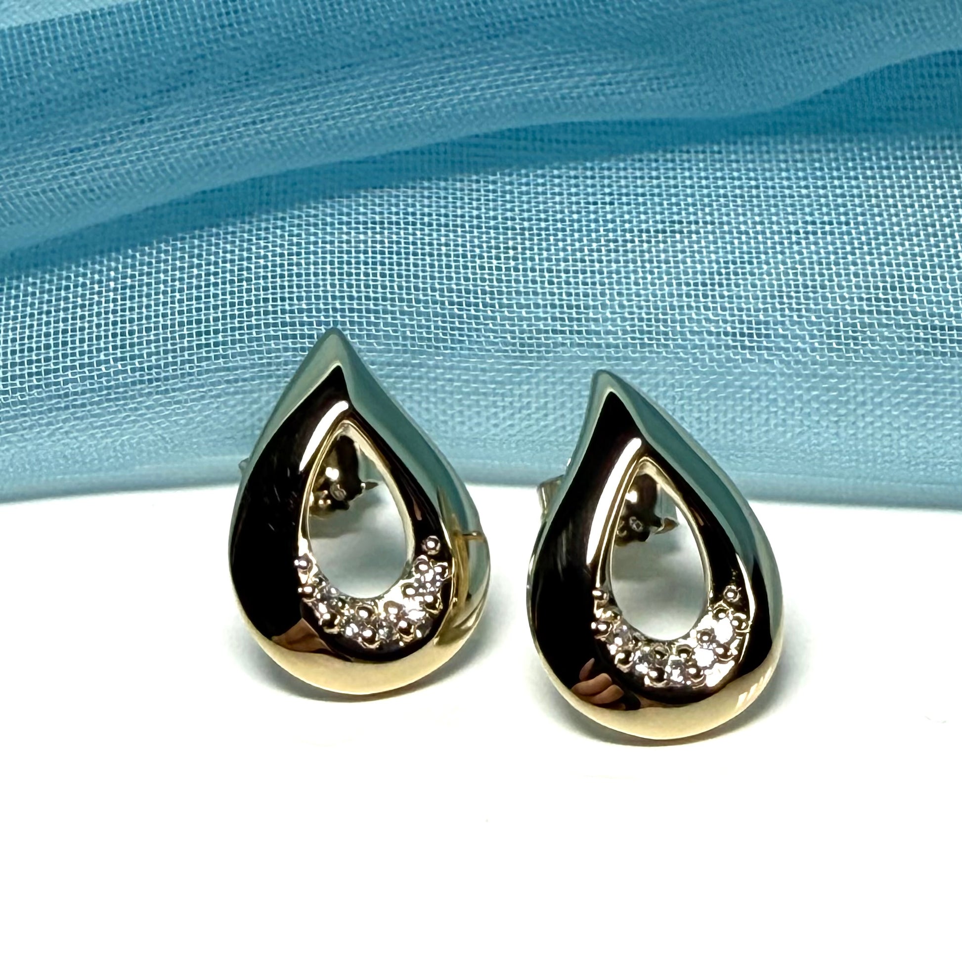 Teardrop shaped earrings open stud dropped cubic zirconia sterling silver gilt, gold plated