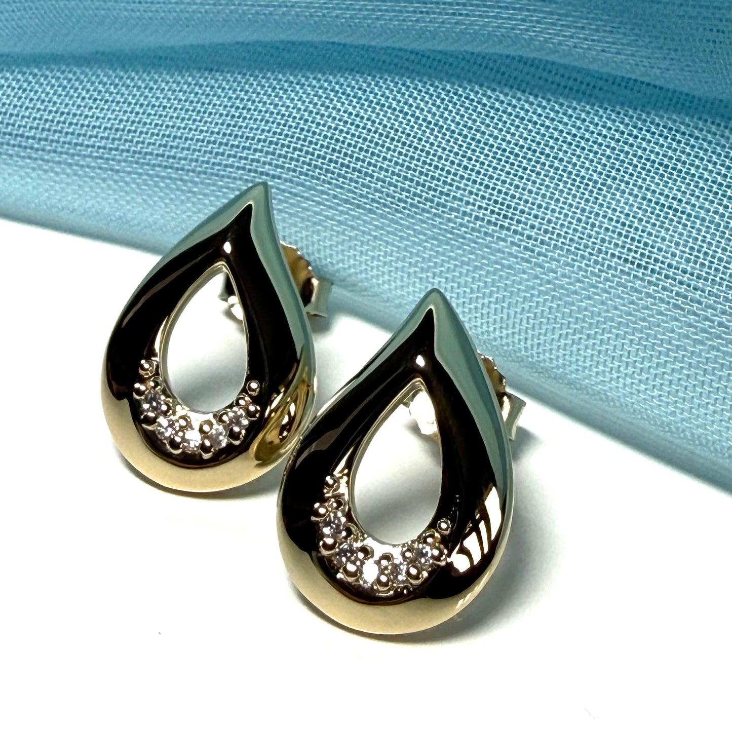 Teardrop shaped open stud earrings dropped cubic zirconia sterling silver gilt, gold plated