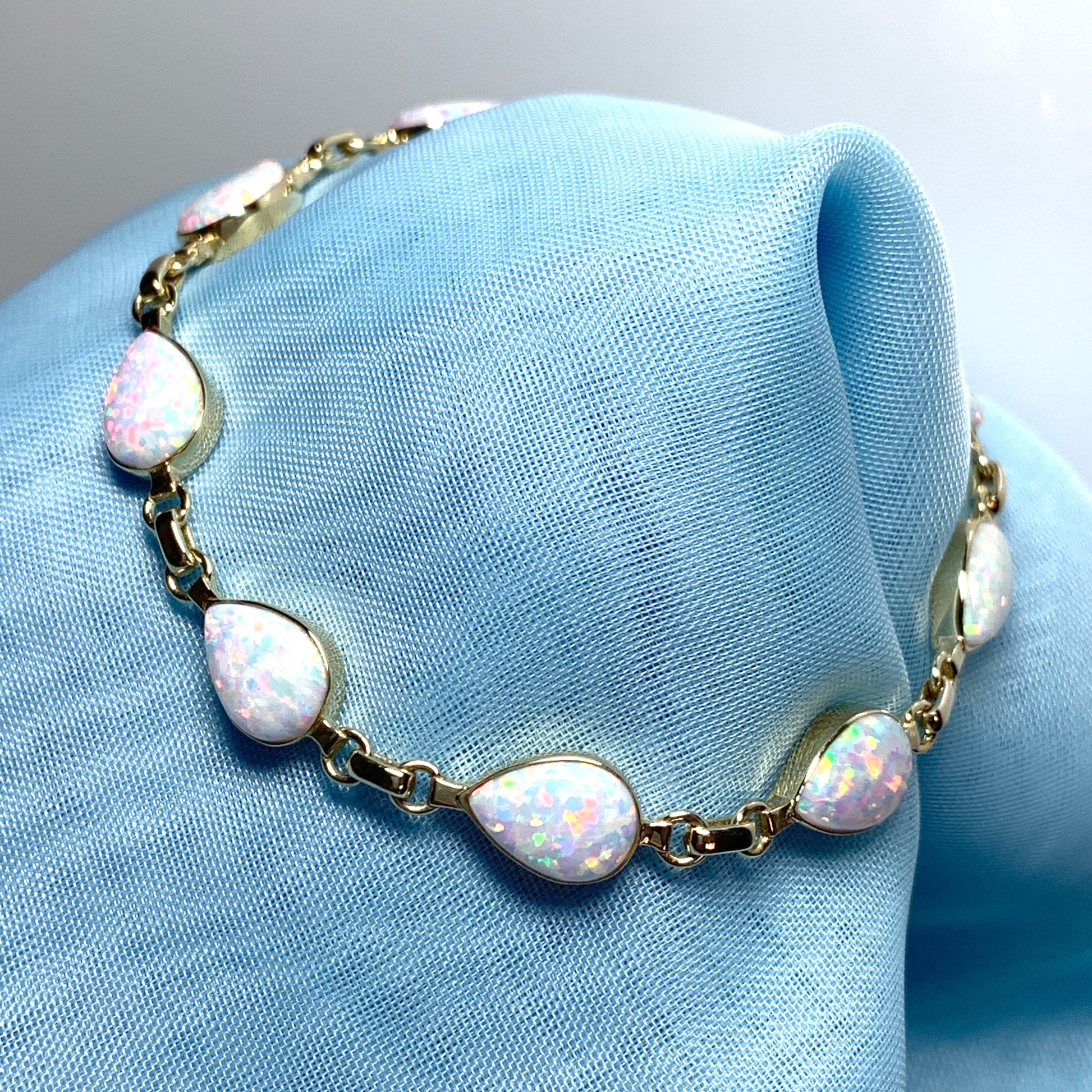 Teardrop opal yellow gold bracelet