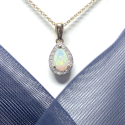 Teardrop shaped opal and diamond yellow gold cluster necklace