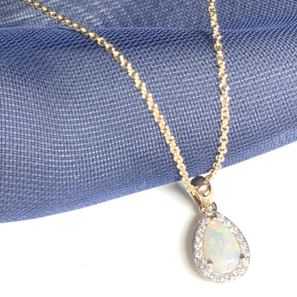 Teardrop shaped opal and diamond yellow gold cluster necklace