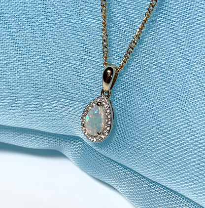 Teardrop shaped opal and diamond yellow gold cluster necklace