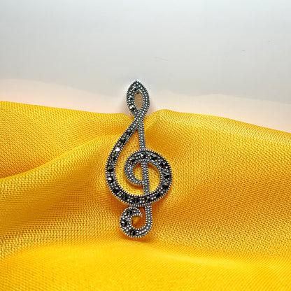 Treble clef brooch set with marcasite stones musical note sterling silver