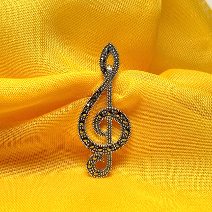 Treble clef brooch set with marcasite stones musical note sterling silver