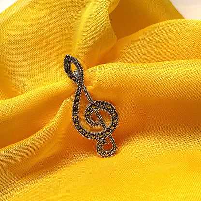 Treble clef brooch set with marcasite stones musical note sterling silver