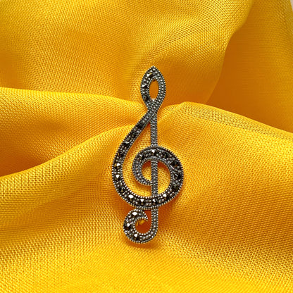 Treble clef brooch set with marcasite stones musical note sterling silver