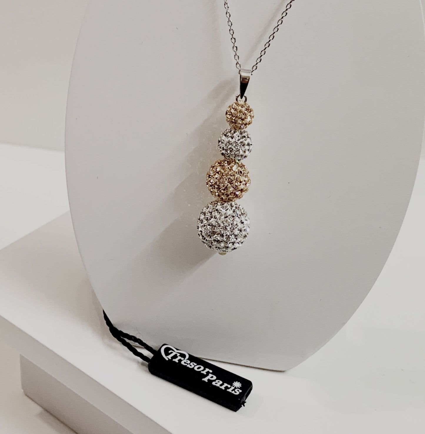 Tresor Paris White and Gold Crystal Necklace Pendant