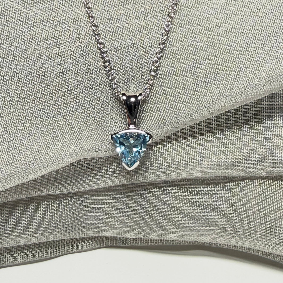 Triangle shaped real blue topaz necklace sterling silver pendant
