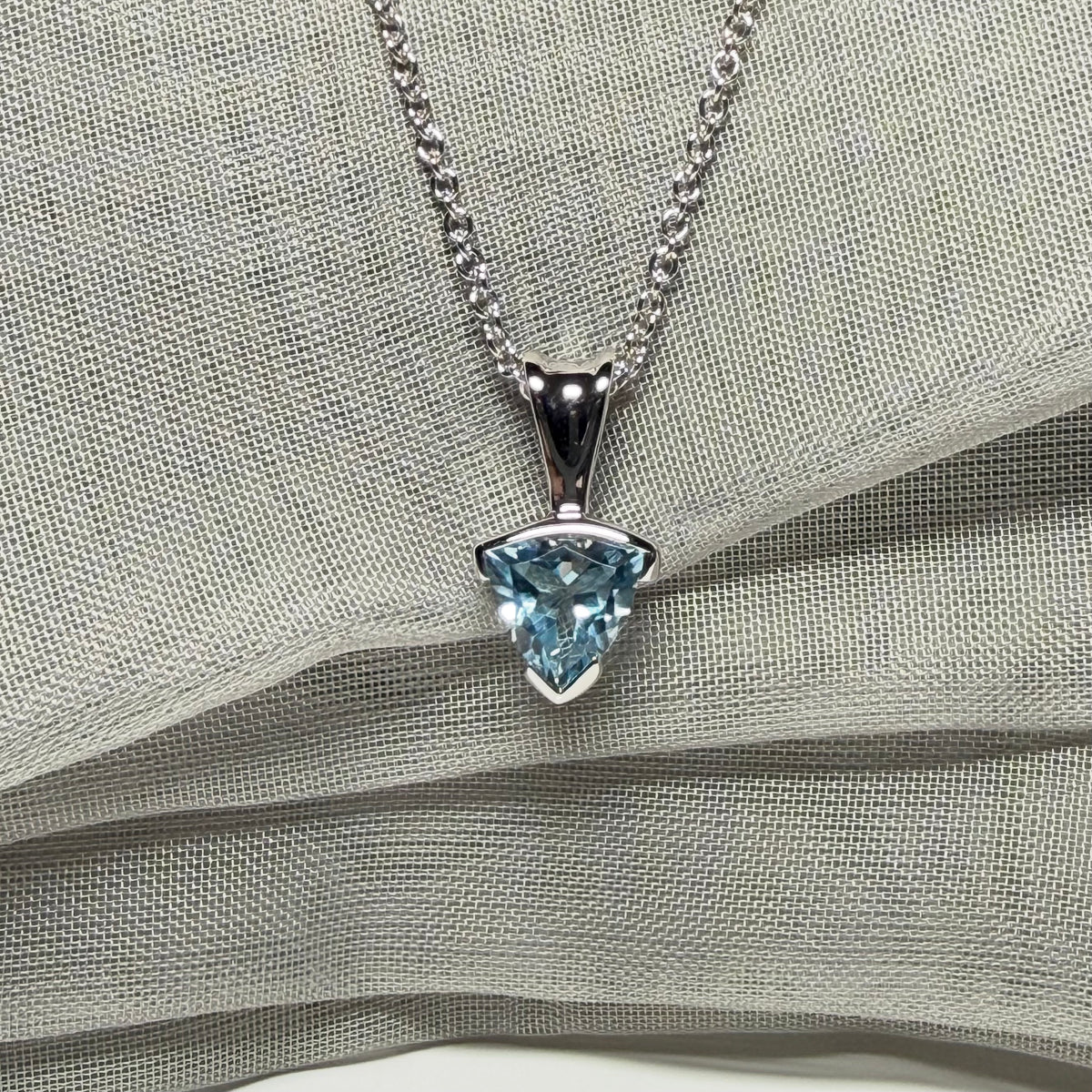 Triangle shaped real blue topaz necklace sterling silver pendant