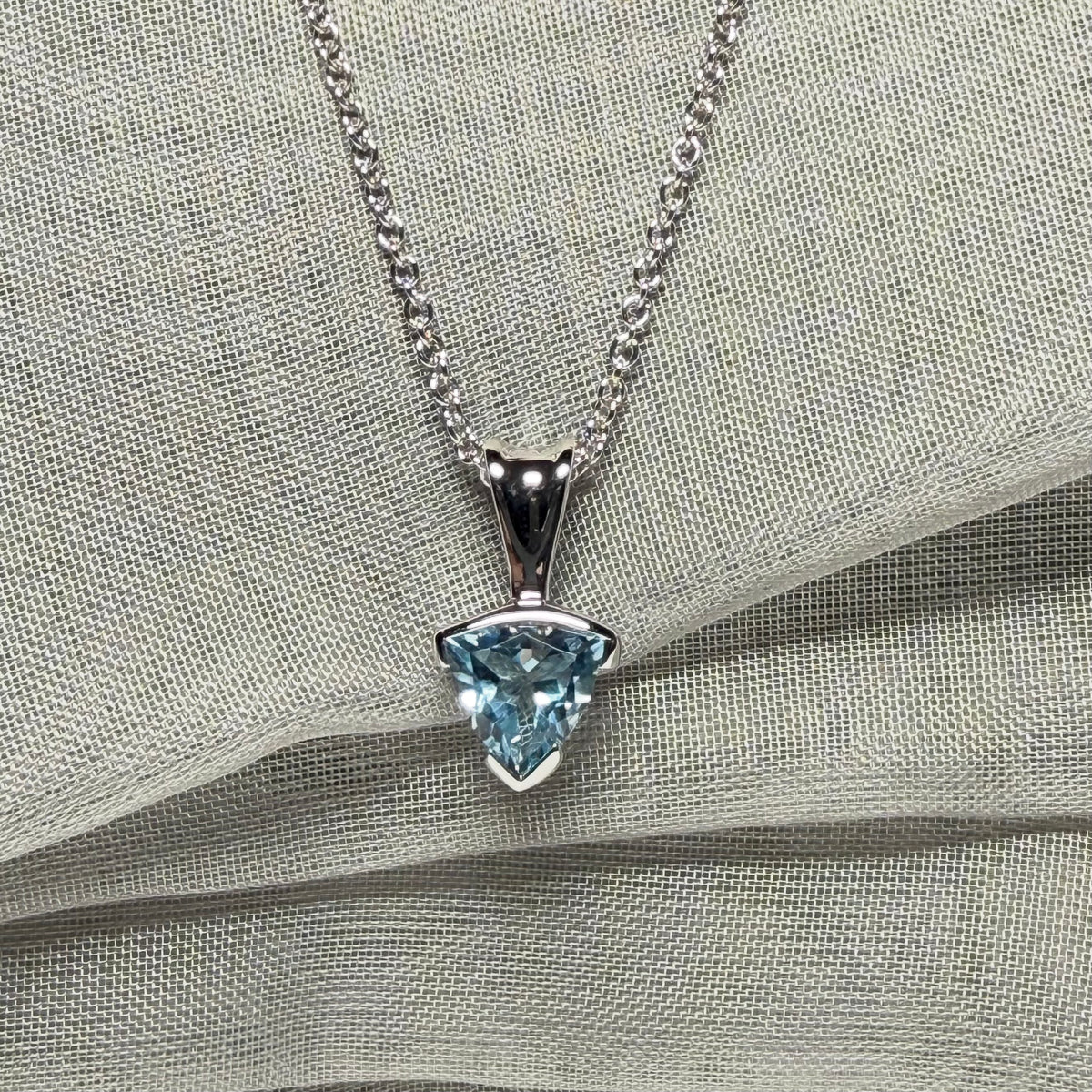 Triangle shaped real blue topaz necklace sterling silver pendant