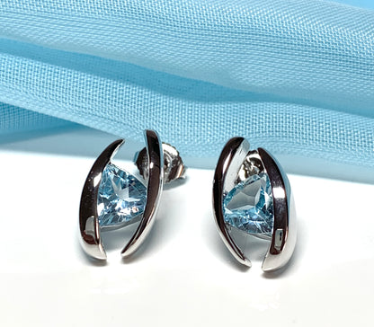 Triangle shaped sterling silver real light blue topaz fancy stud earrings