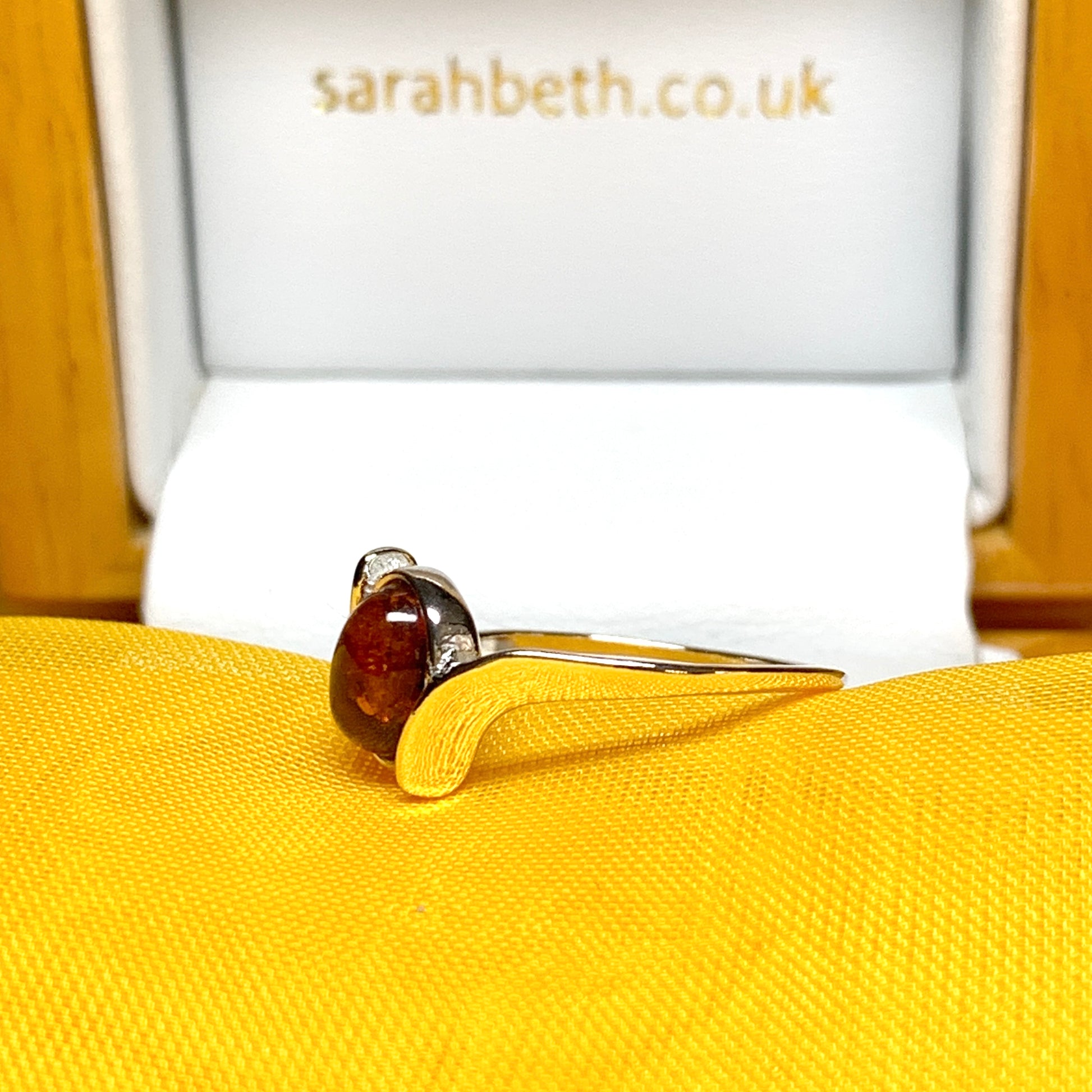 Twisted Sterling Silver Oval Orange Amber Ring