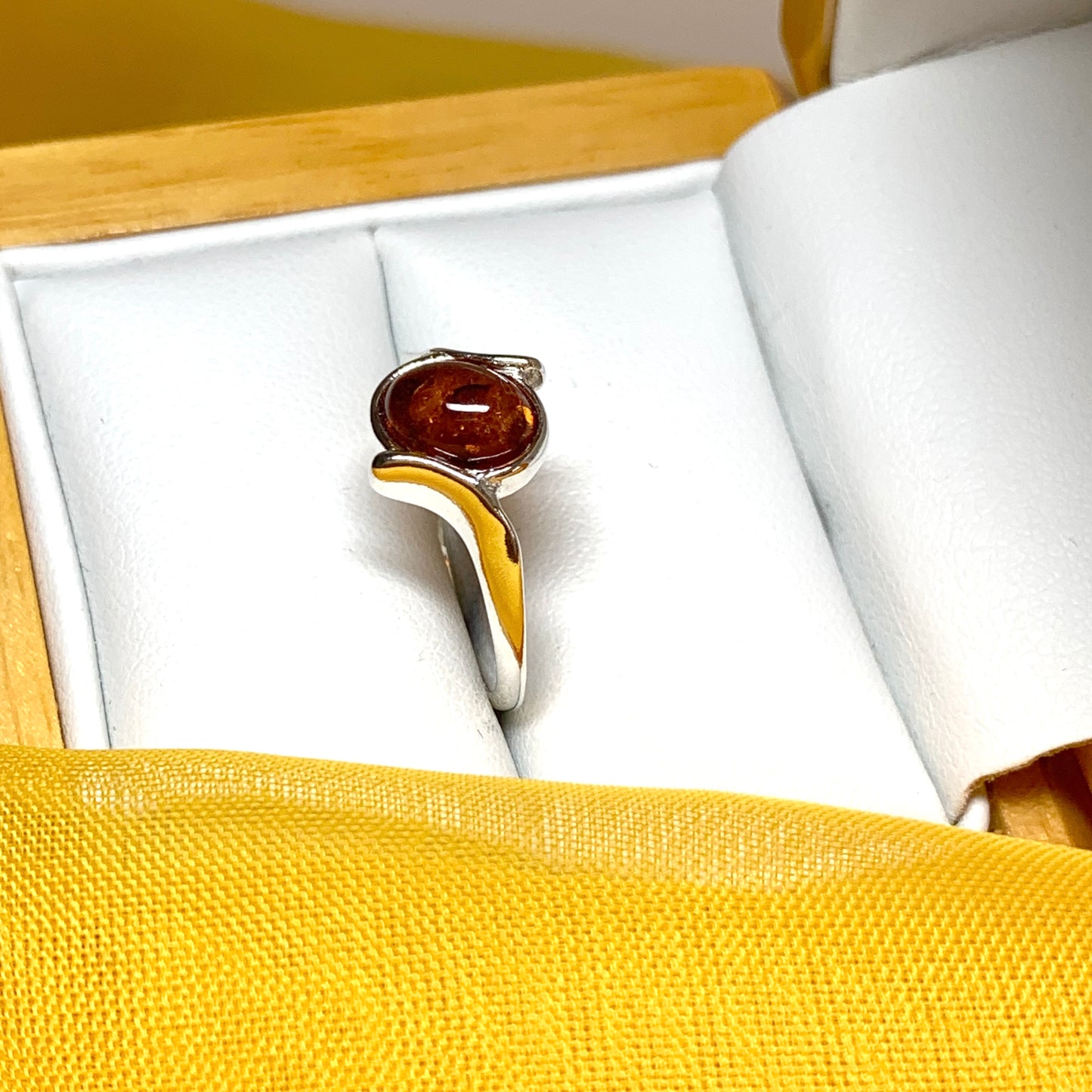 Twisted Sterling Silver Oval Orange Amber Ring