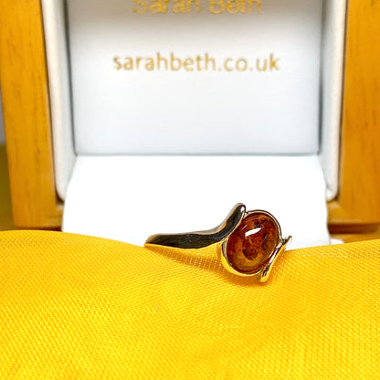 Twisted Sterling Silver Oval Orange Amber Ring