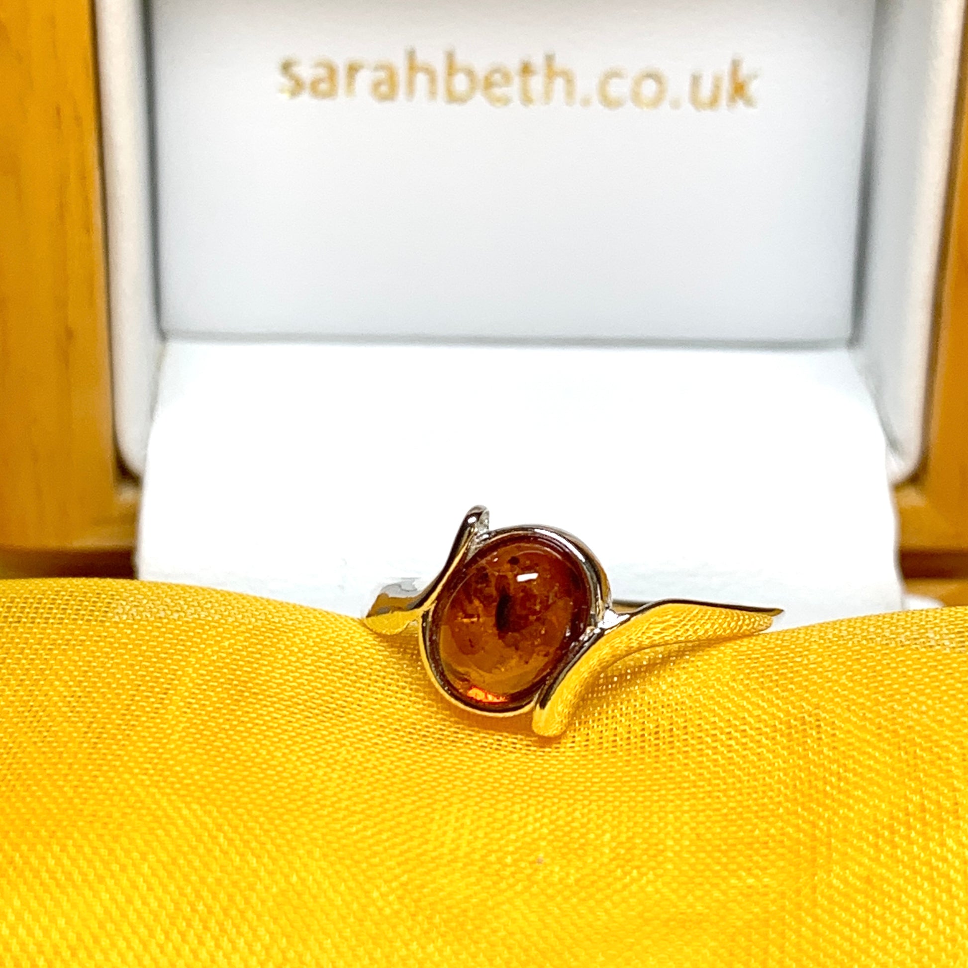 Twisted Sterling Silver Oval Orange Amber Ring