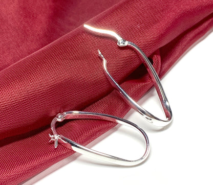 Oval twisted polished hoop earrings sterling silver