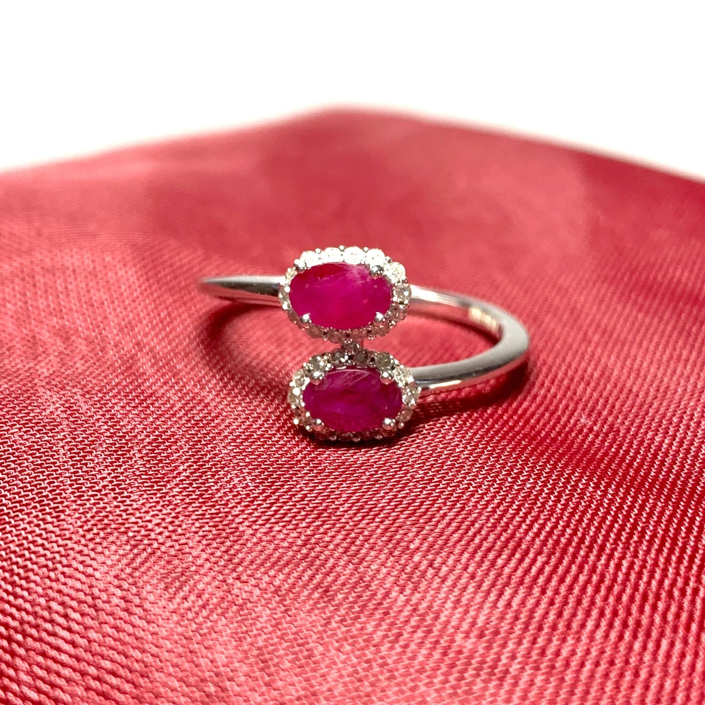 Crossover twist ruby diamond oval double cluster ring white gold
