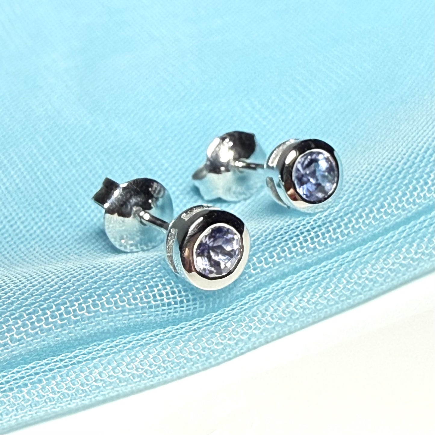 White gold real tanzanite silver round cut smooth rubbed over stud earrings