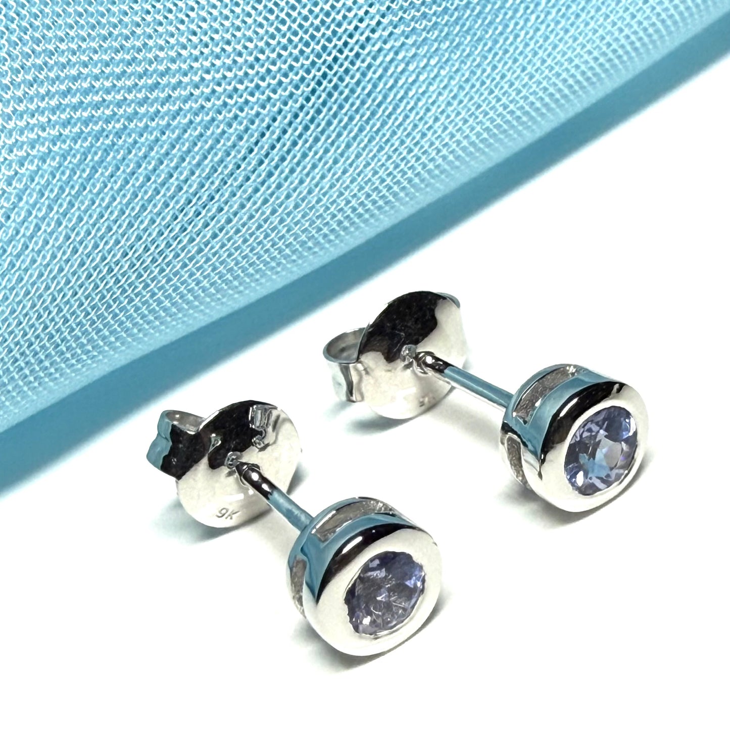White gold real tanzanite silver round cut smooth rubbed over stud earrings