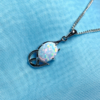 White gold celtic design oval opal necklace