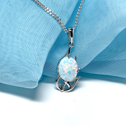 White gold celtic design oval opal necklace