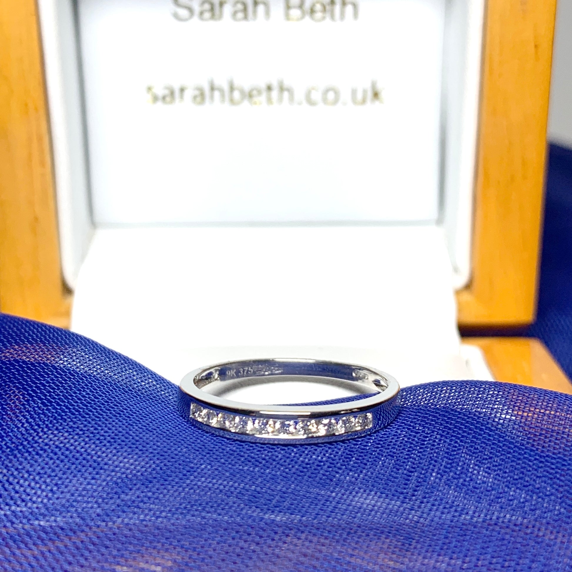 White gold channel set diamond eternity ring 15 points