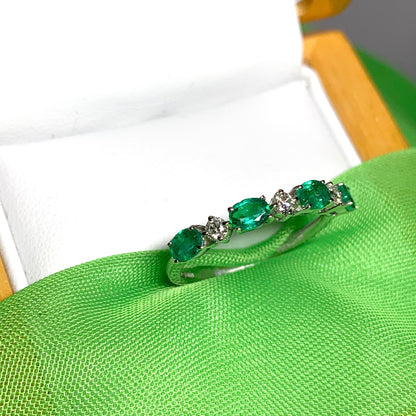 White gold oval green real emerald and diamond eternity ring