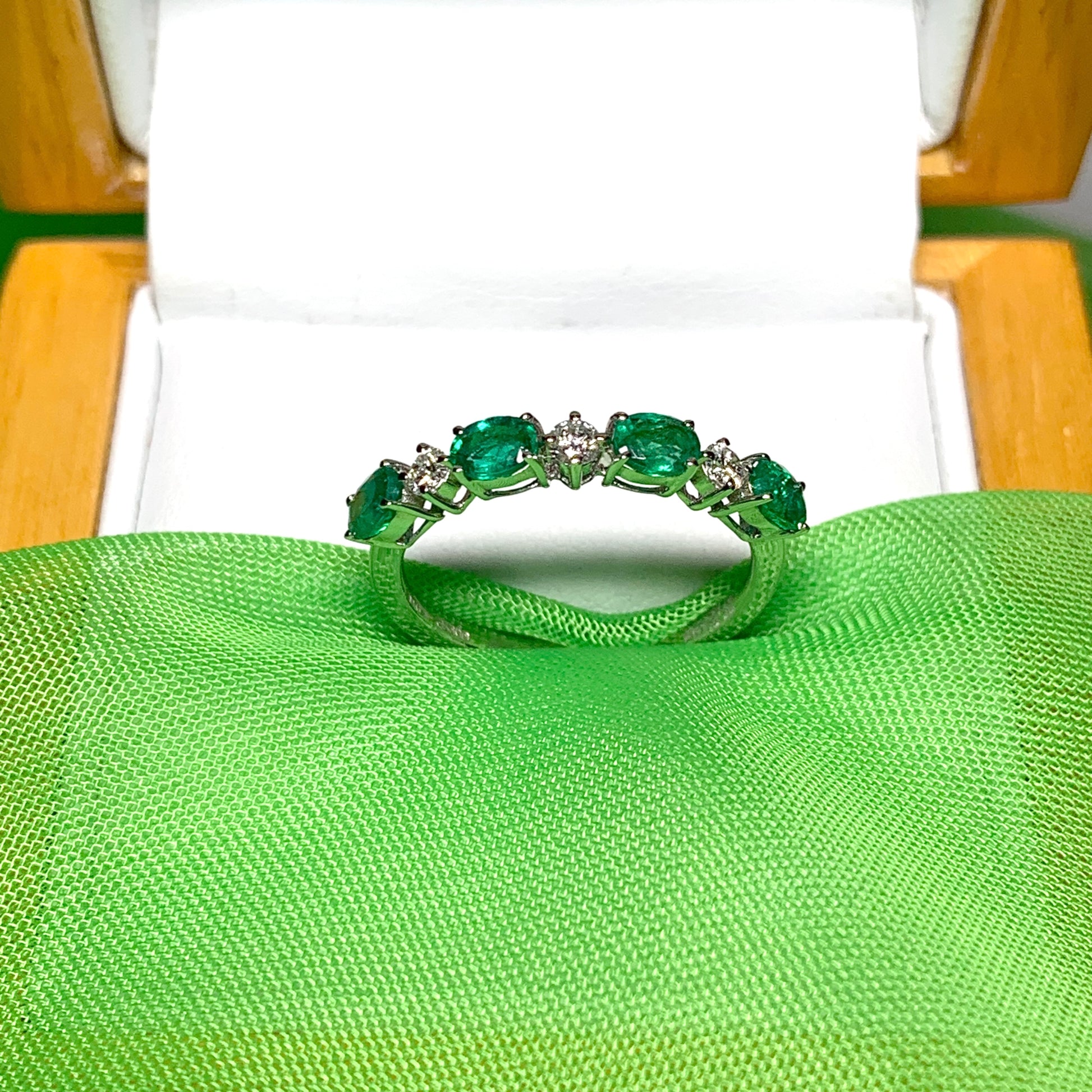 White gold oval green real emerald and diamond eternity ring