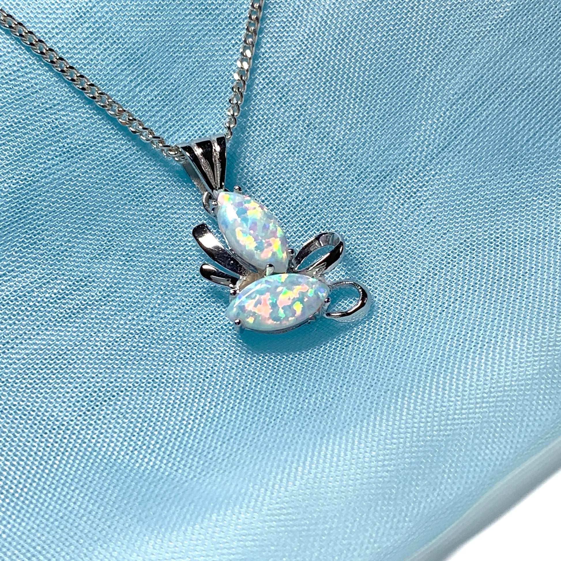White gold marquise opal swirl necklace
