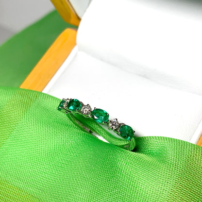 White gold oval green real emerald and diamond eternity ring