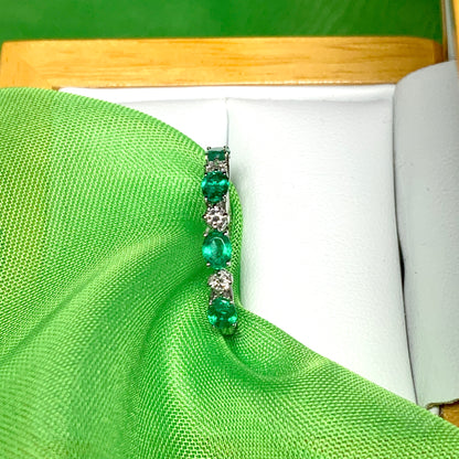 White gold oval green real emerald and diamond eternity ring