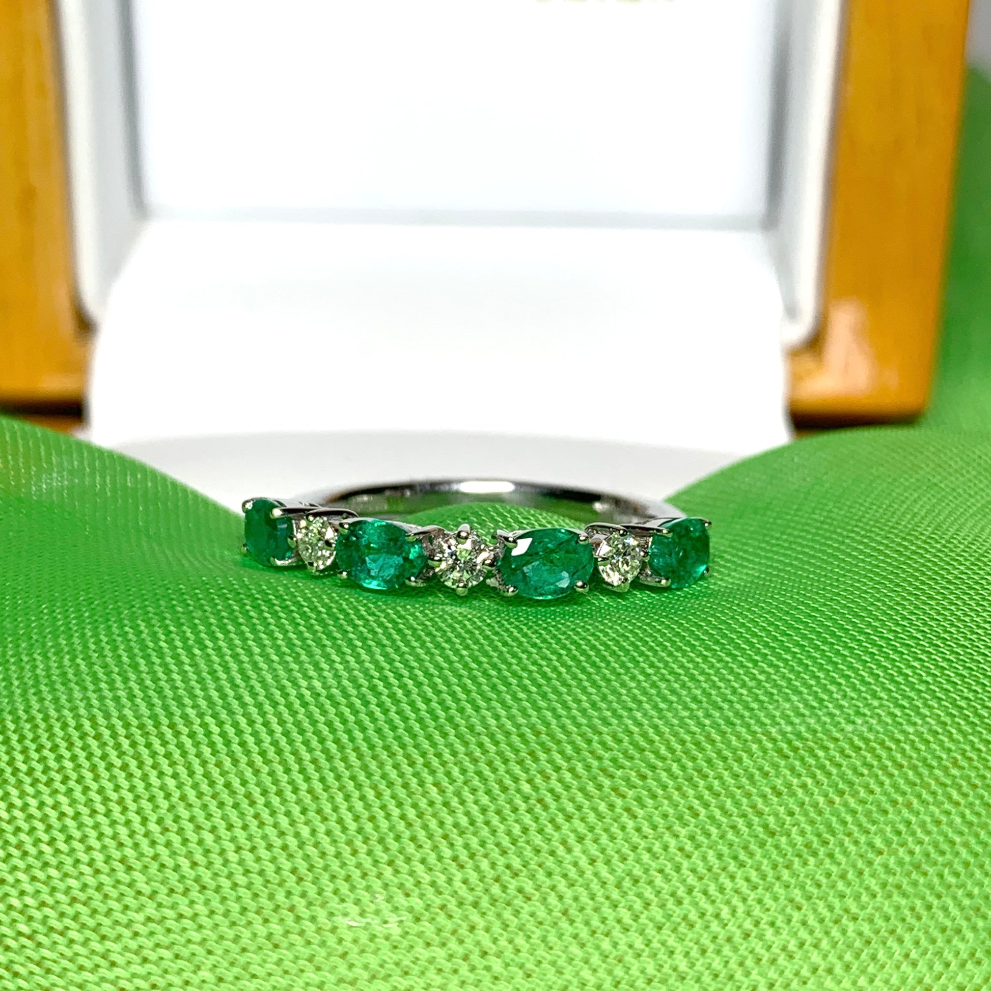 White gold oval green real emerald and diamond eternity ring