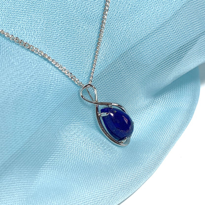 White gold pear teardrop shaped blue lapis lazuli necklace pendant