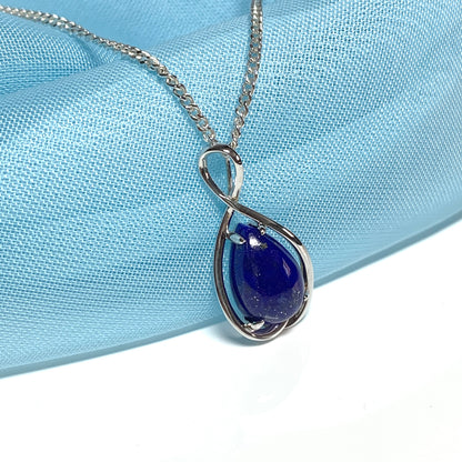 White gold pear teardrop shaped blue lapis lazuli necklace pendant