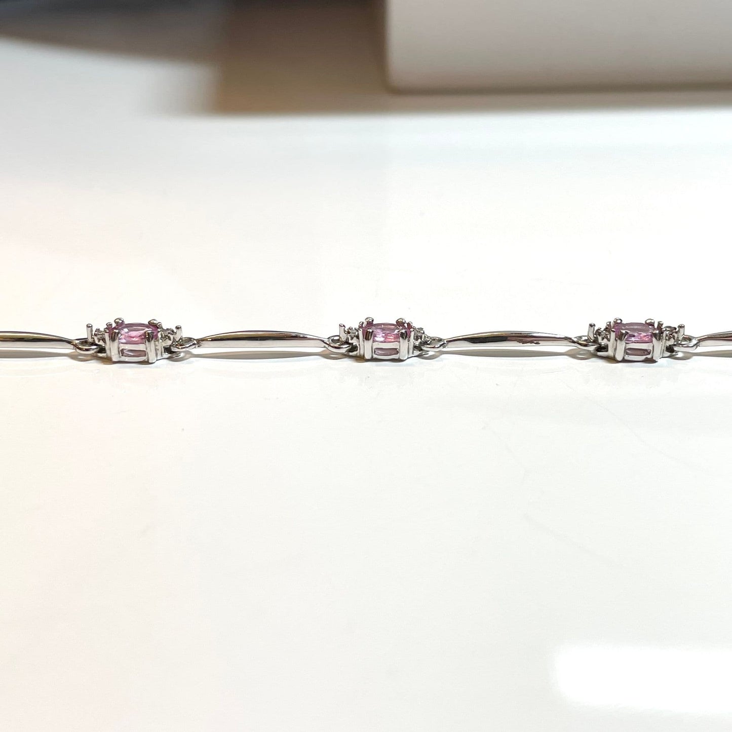 Pink sapphire and diamond white gold bracelet