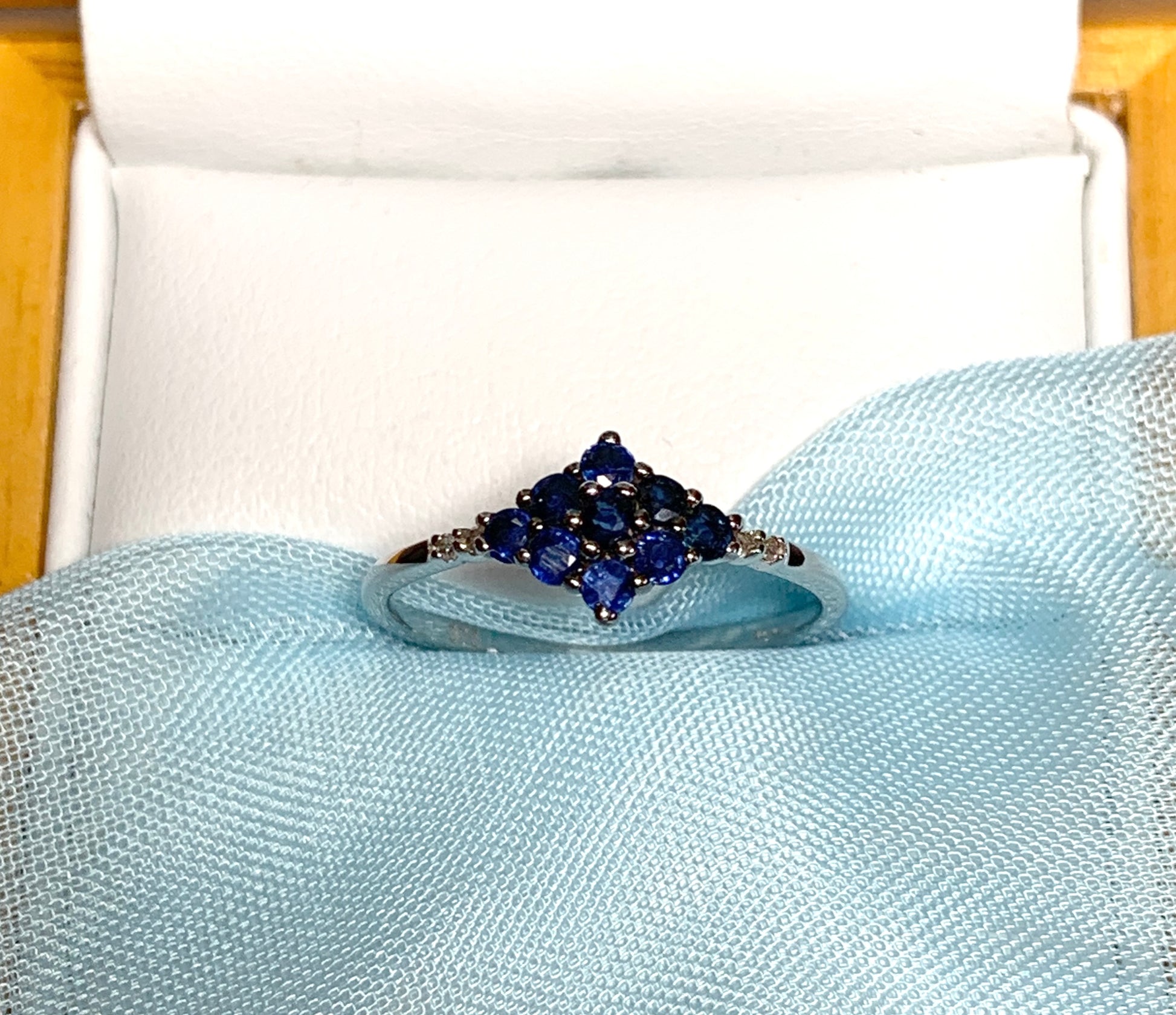 White gold real blue sapphire and diamond claw cluster ring