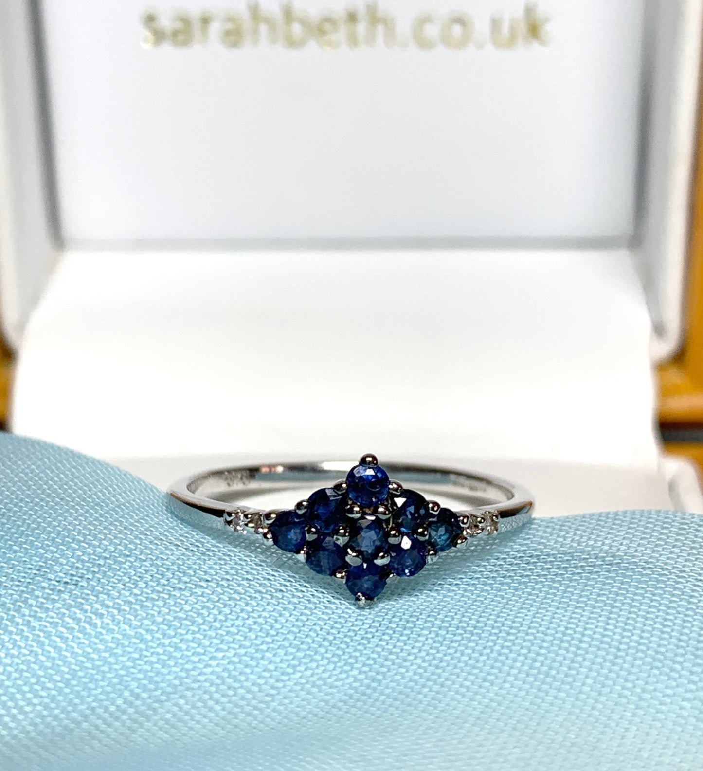 White gold real blue sapphire and diamond claw cluster ring