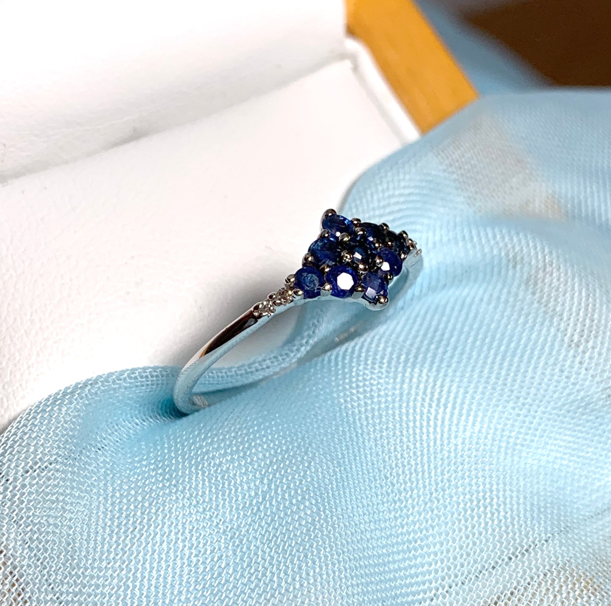 White gold real blue sapphire and diamond claw cluster ring