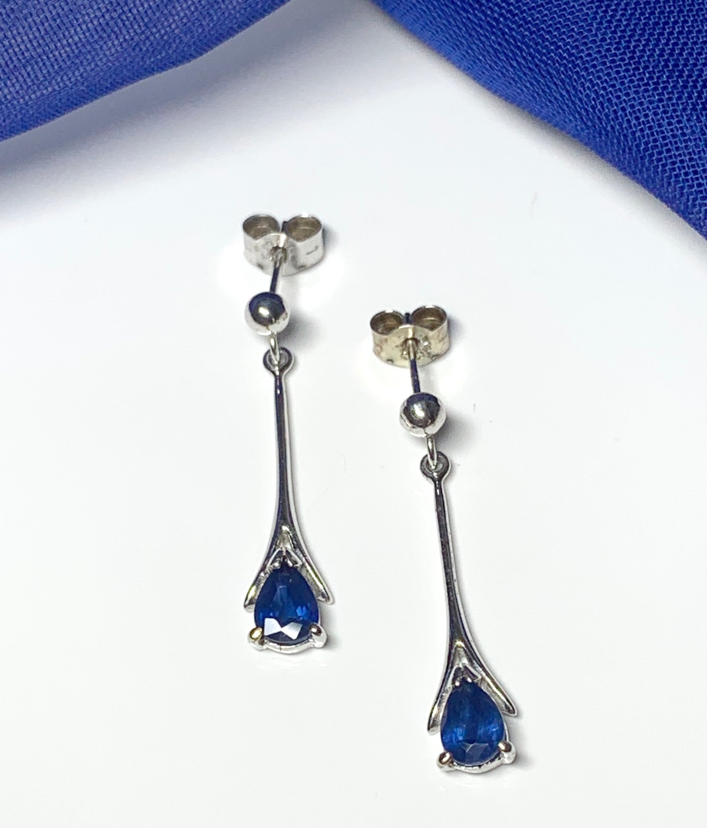 Sapphire white gold long drop earrings