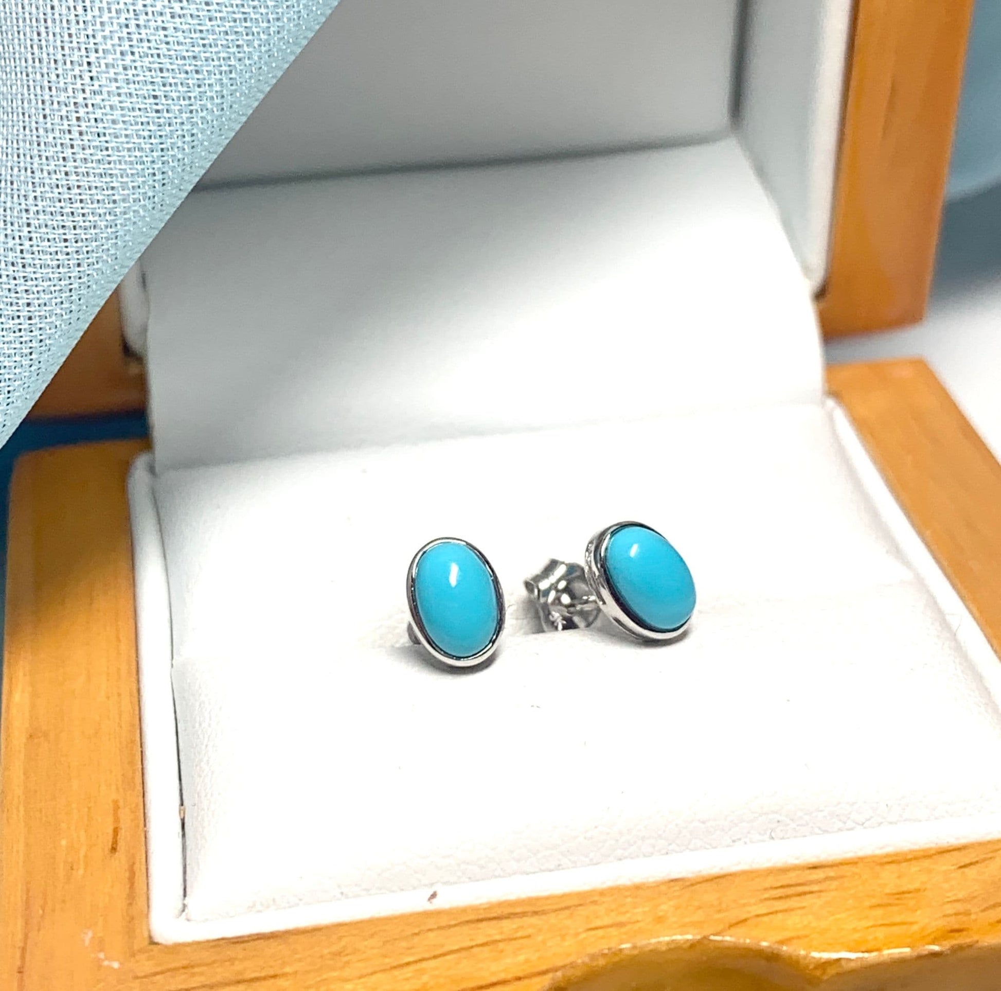 Turquoise oval white gold stud earrings