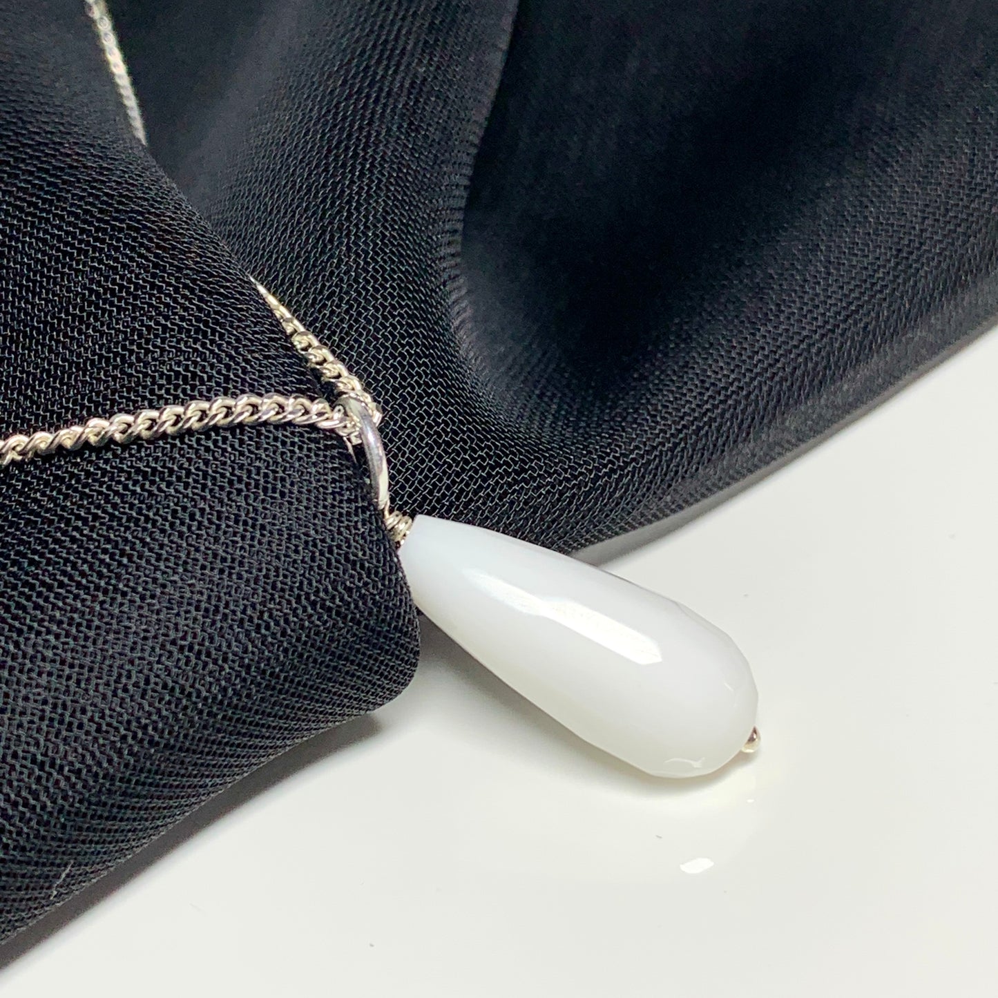 White teardrop shaped agate necklace pendent