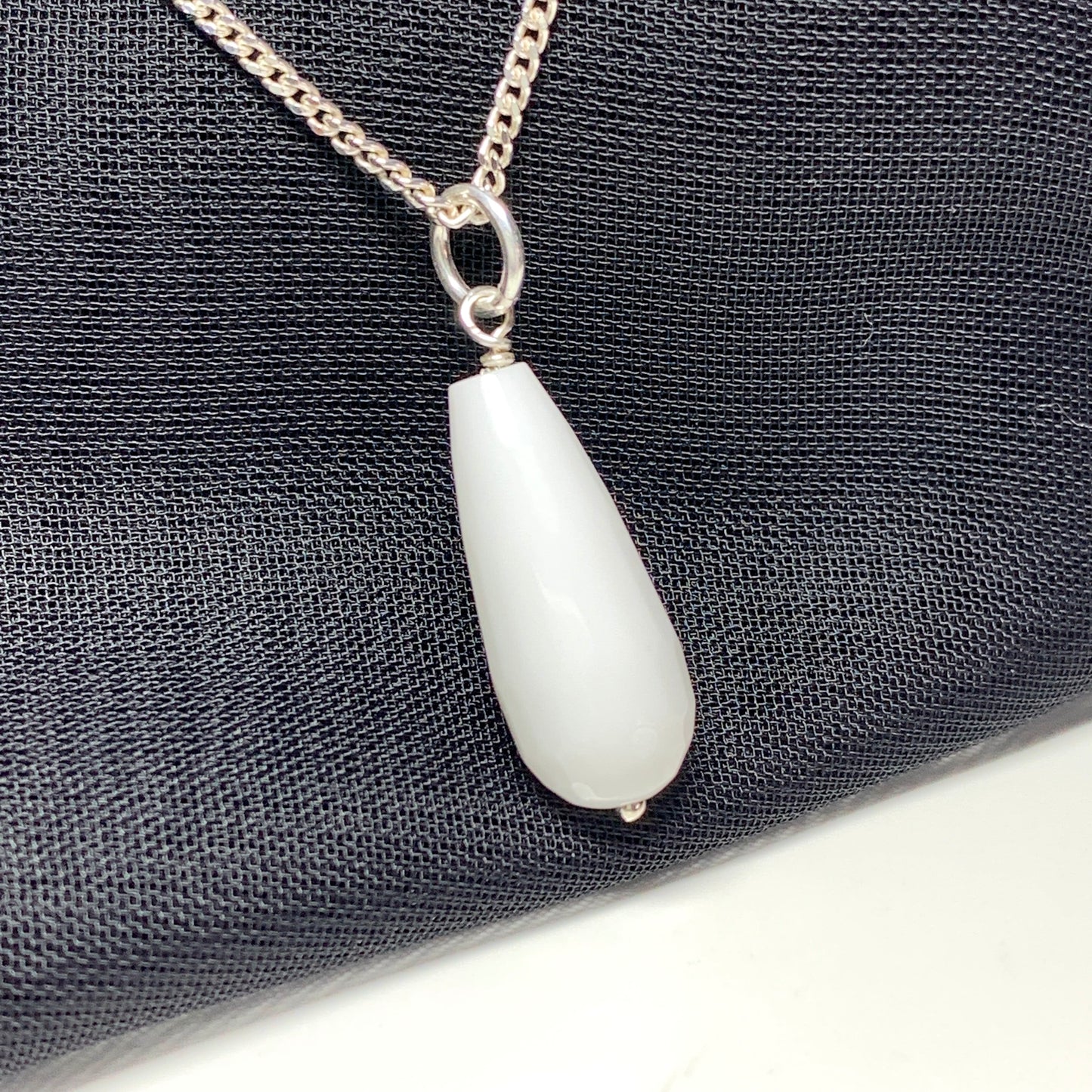 White teardrop shaped agate necklace pendent