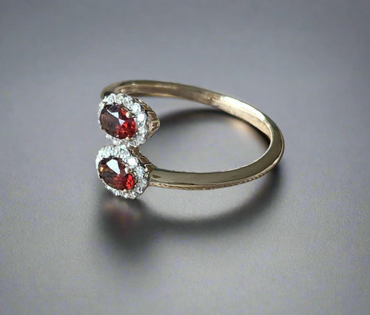 Yellow Gold Crossover Twist Garnet And Diamond Oval Cluster Ring