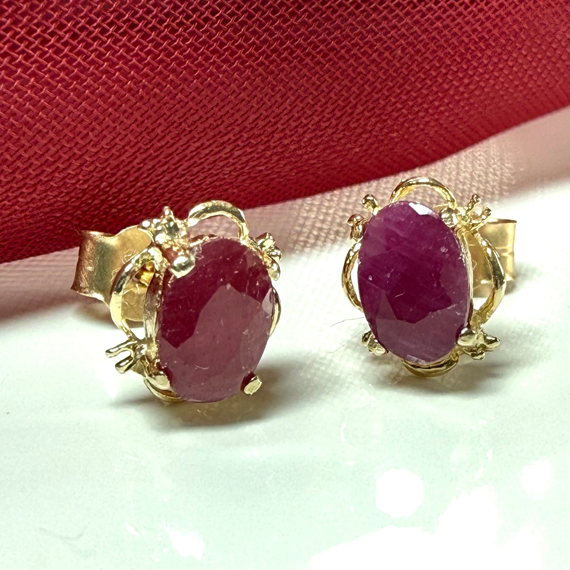 Yellow Gold Pierced Oval Ruby Stud Earrings