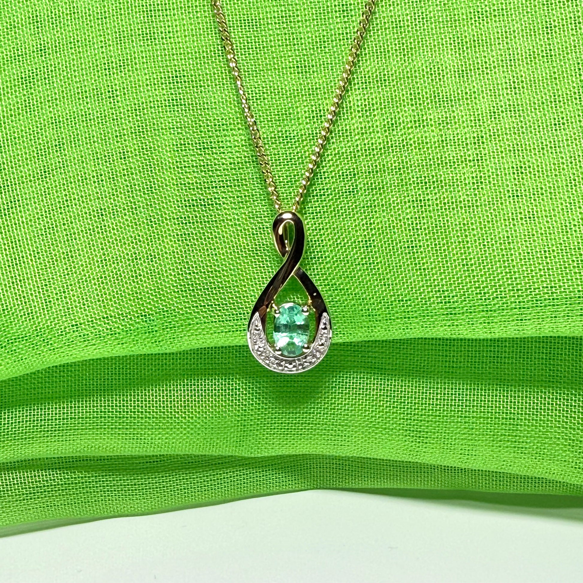 Yellow gold emerald and diamond necklace with chain