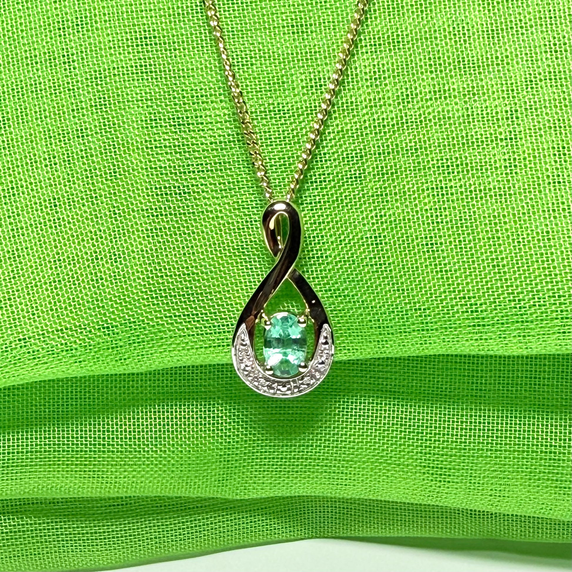 Yellow gold emerald and diamond necklace with chain