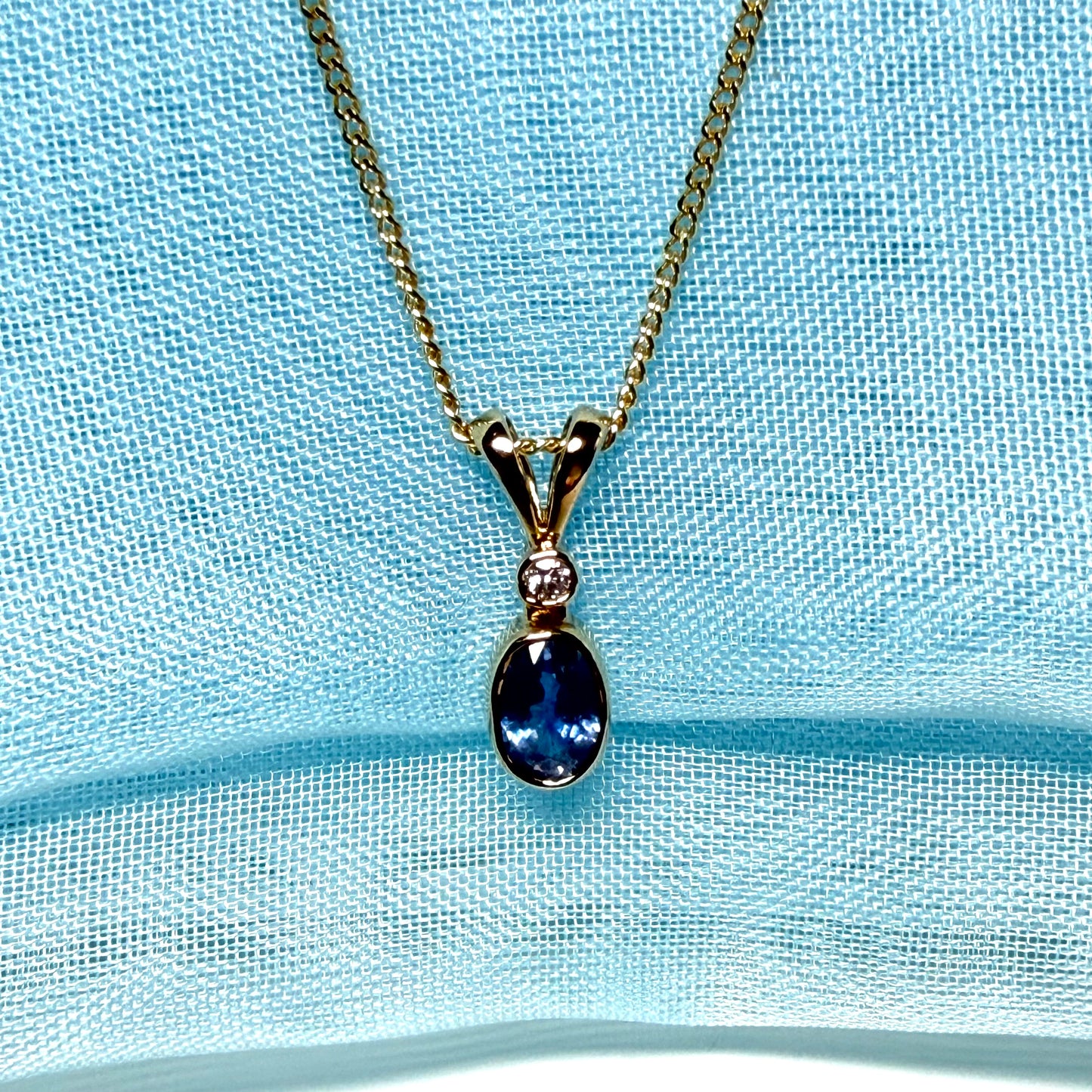 Yellow gold necklace real blue sapphire and diamond round and oval shaped pendant