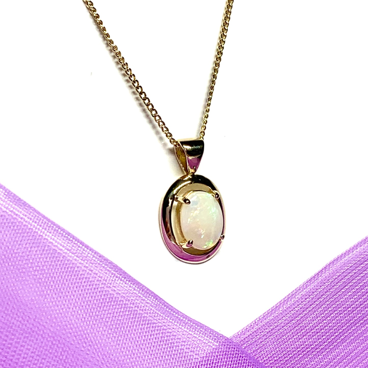 Yellow gold oval real opal necklace pendant