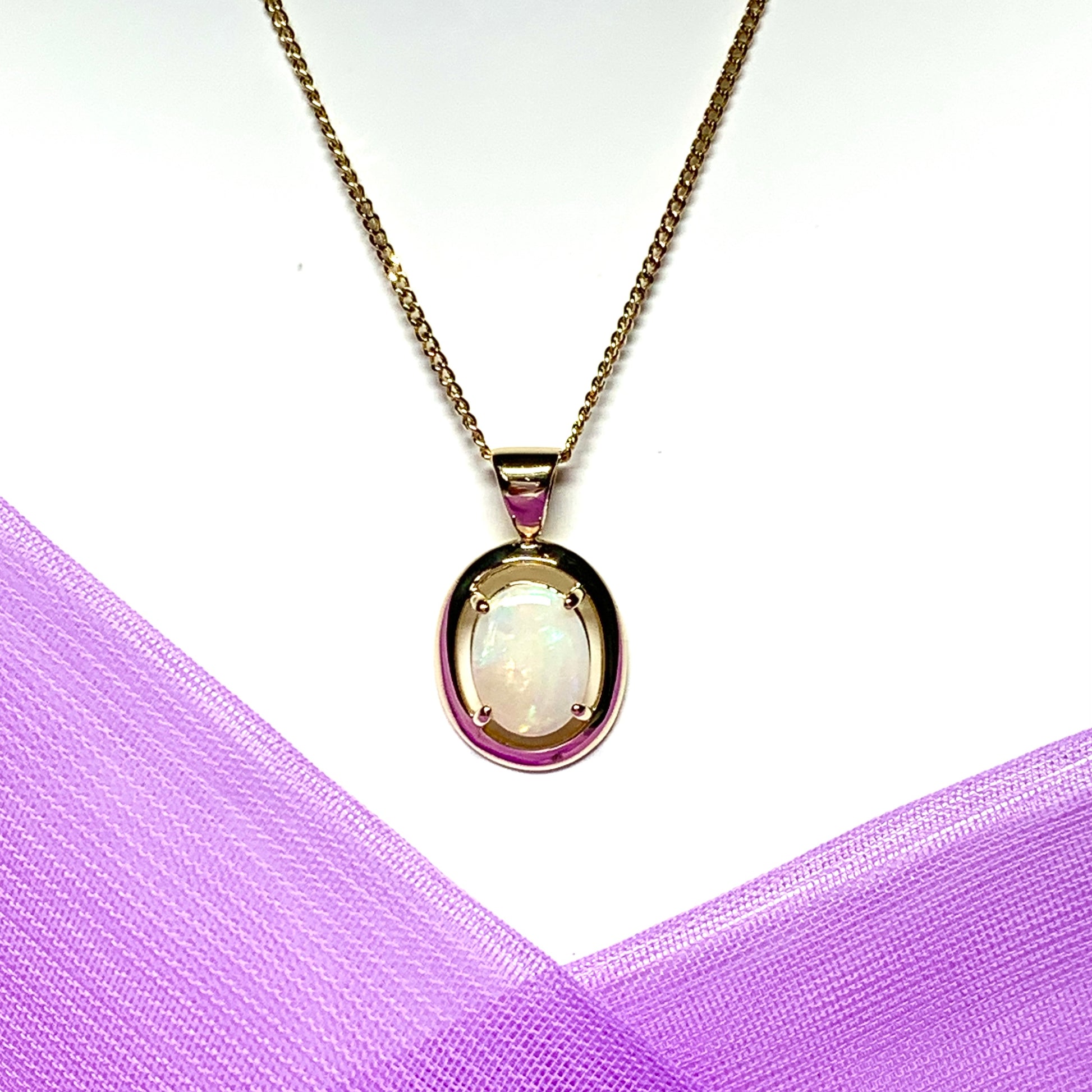 Yellow gold oval real opal necklace pendant